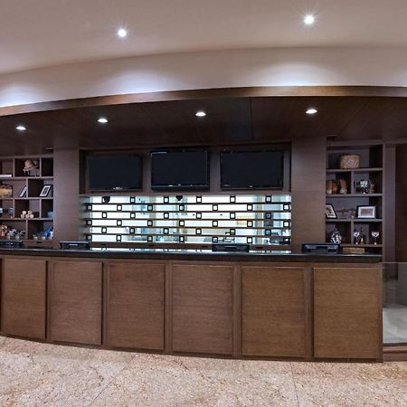 Four Points By Sheraton Galerias Monterrey Exterior photo The reception desk at the library