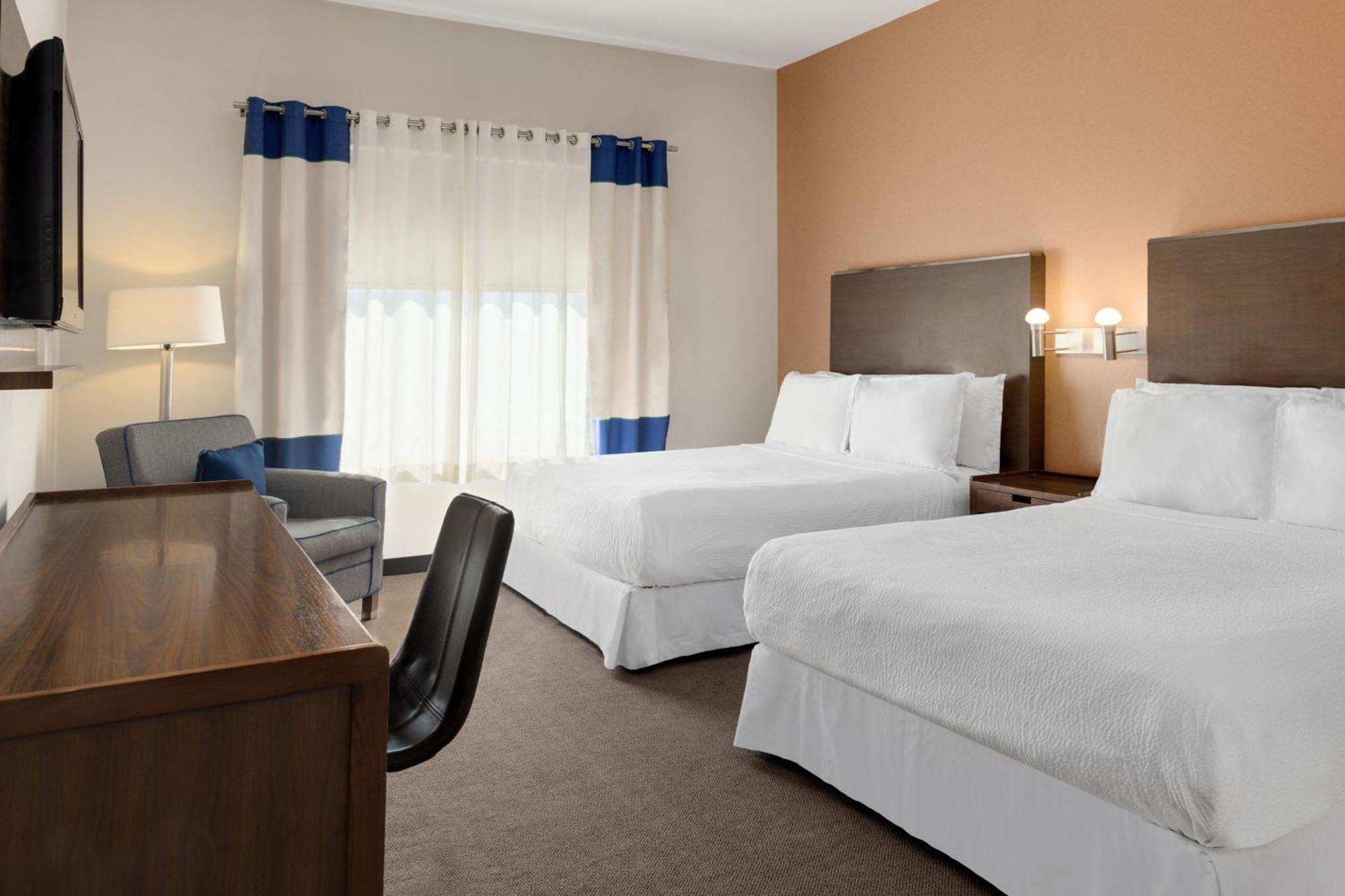 Four Points By Sheraton Galerias Monterrey Exterior photo A typical guest room at an extended stay hotel
